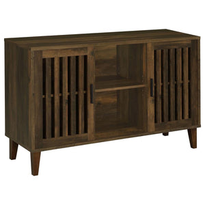 Lean rustic in a bold farmhouse-industrial style setting with a spacious accent cabinet. Ideal for both dining rooms and media spaces, the Torin accent cabinet is built of dramatic dark pine finished rubberwood and wood products with woodgrain markings. S
