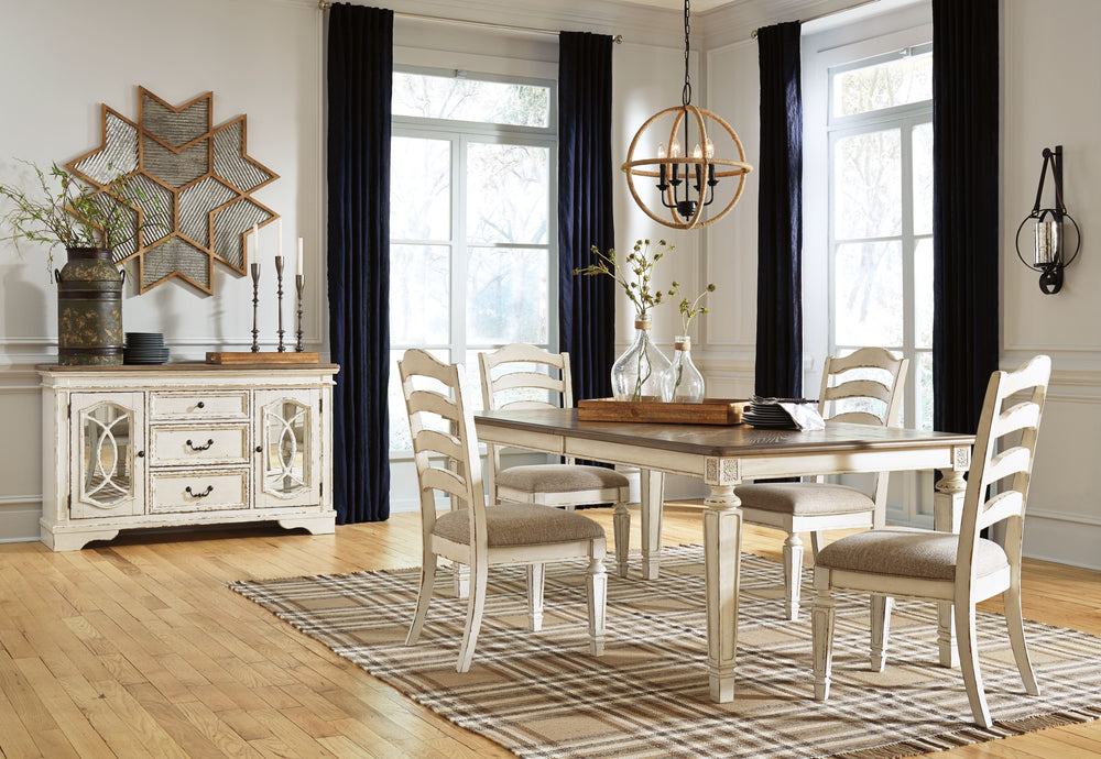 Traditional cottage design. Antiqued two-tone finish featuring chipped white with distressed wood finished tops. Tops feature Oak veneers, while the cases are made with birch veneers and hardwood solids. Framed drawer fronts and decorative fret laid over 