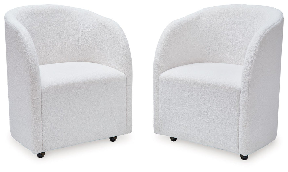 Inspired by art deco design, this fully upholstered dining chair makes a lasting impression in a simply stunning way. Its magnificent curved silhouette is enhanced with a neutral boucle upholstery thatâ€™s so pleasing to the palate. This is the piece youâ