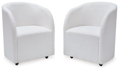 Inspired by art deco design, this fully upholstered dining chair makes a lasting impression in a simply stunning way. Its magnificent curved silhouette is enhanced with a neutral boucle upholstery thatâ€™s so pleasing to the palate. This is the piece youâ