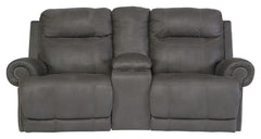Sparing that -"puffy-" look you might expect from a recliner, this reclining loveseat with console doesn-'t hold back when it comes to contemporary style. Subtle touches such as sporty jumbo stitching, nailhead trim and a -"weather worn-" effect on the up