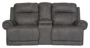 Sparing that -"puffy-" look you might expect from a recliner, this reclining loveseat with console doesn-'t hold back when it comes to contemporary style. Subtle touches such as sporty jumbo stitching, nailhead trim and a -"weather worn-" effect on the up