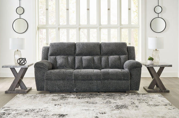  this extra-spacious reclining sofa is a masterclass in accessible style. Plush