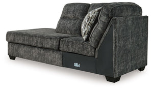 This left-arm facing corner chaise is made with polyester upholstery. Pairs with other items in the series to make a sectional.<br><br><b>Additional Dimensions</b><br><ul><li>Arm height: 27-"</li><li>Seat depth: 72-"</li><li>Seat height: 20-"</li><li>Top 