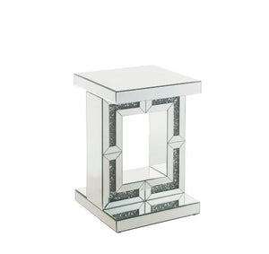 Brighten up your space with this mirrored and faux diamonds Noralie Accent Table. With its unique pedestal base, this table is one your friends and family will all be envious of and will be talking about for years to come. The faux diamond inlay adds the 