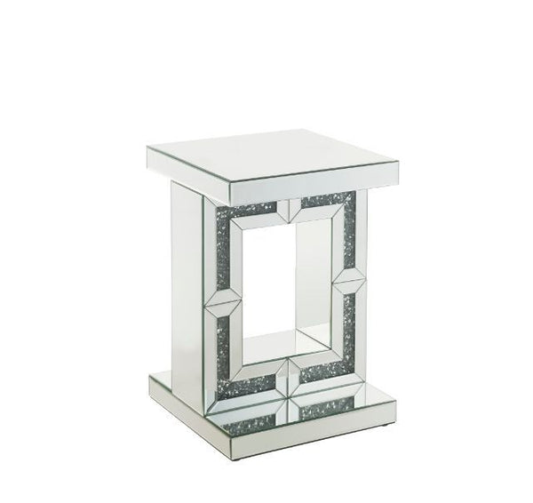 Brighten up your space with this mirrored and faux diamonds Noralie Accent Table. With its unique pedestal base, this table is one your friends and family will all be envious of and will be talking about for years to come. The faux diamond inlay adds the 