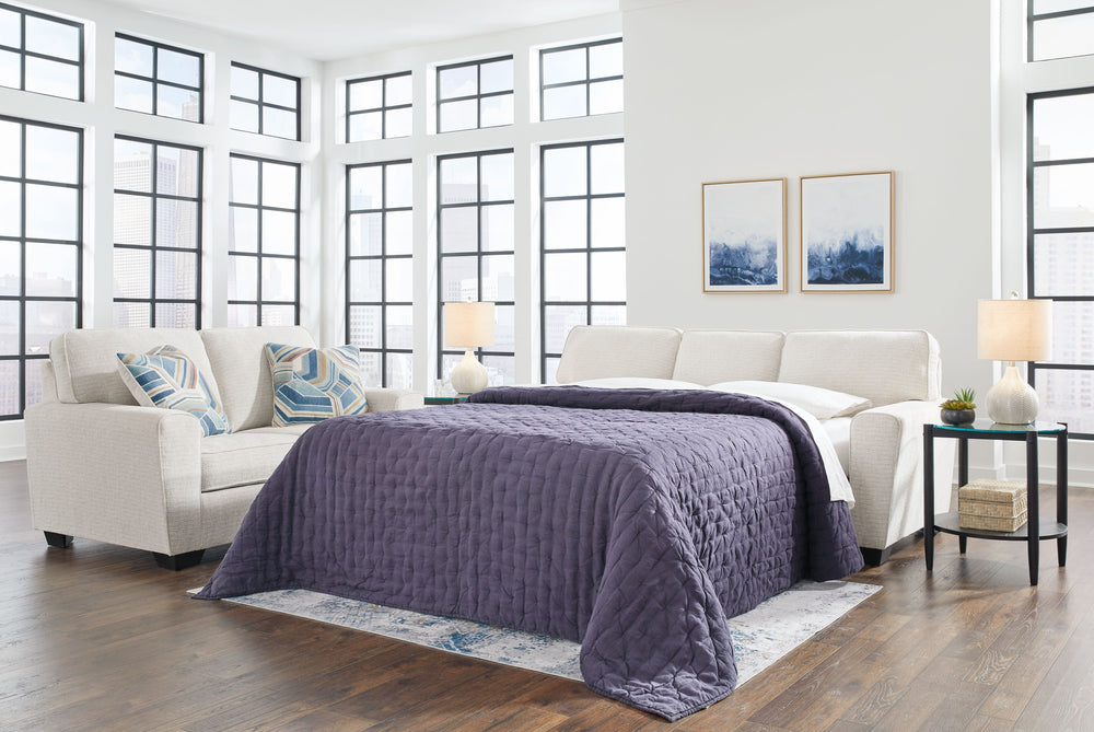 Need a simple style refresh? Liven up your living room essentials with this sofa sleeper. A chunky silhouette holds invitingly ample cushioning youâ€™ll long to lounge in. Crosshatched upholstery and accent pillows give the otherwise casual design a delig
