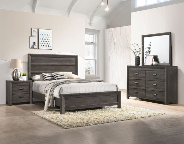 This bedroom set is the embodiment of understated sophistication, featuring a muted gray finish that complements its clean and contemporary design. The robust bed frame anchors the room with a sense of sturdiness and style. Accompanying the bed are coordi