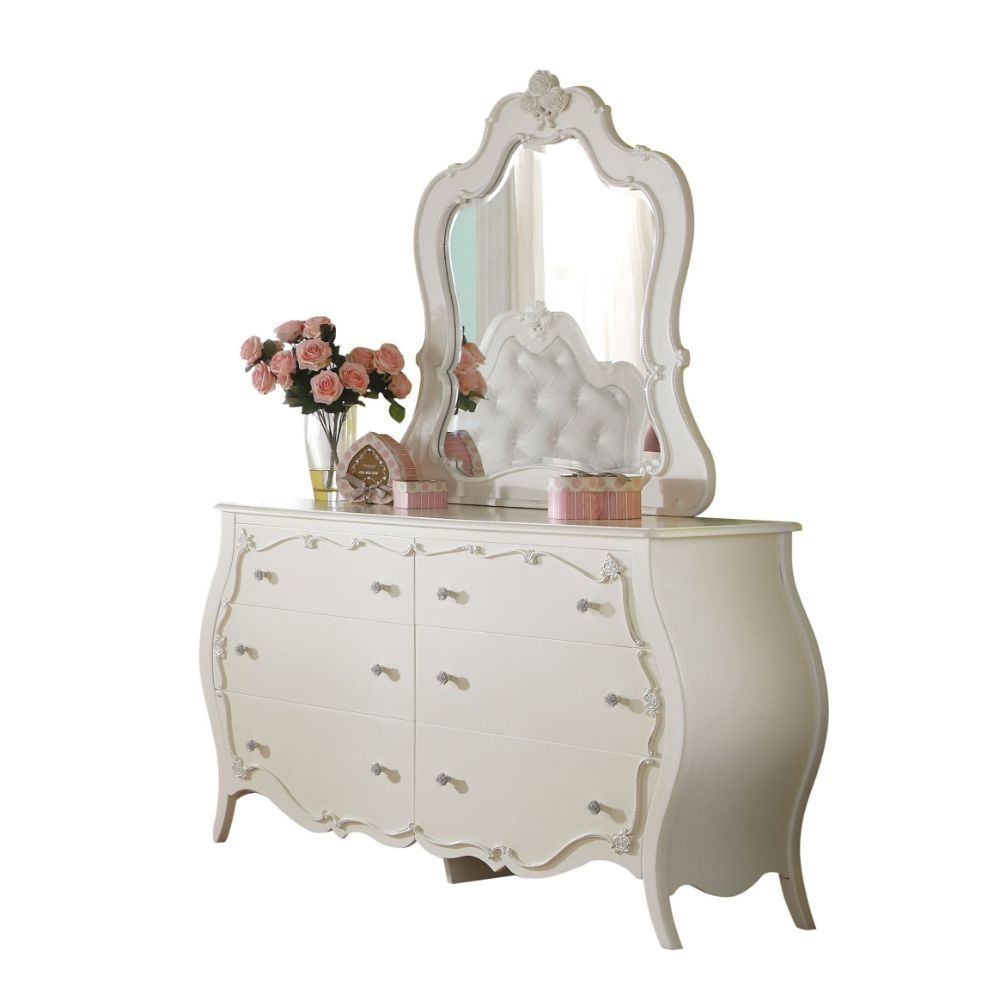 Create the dream bedroom for your little girl with Edalene collection. Beautiful accents are seen throughout including clear rosette knobs and tapered legs. The bed features a pearl white tufted headboard. With many storage options and details like floral