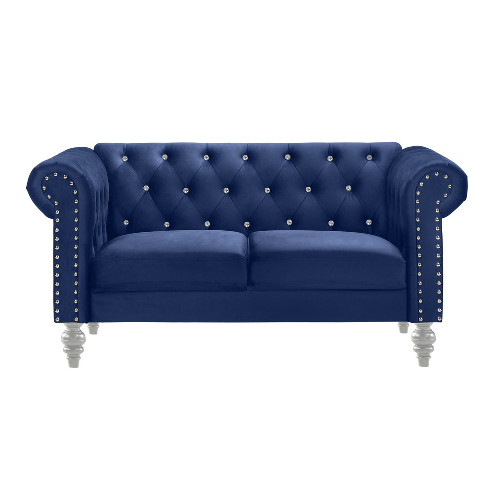 The New Classic Emma Chesterfield Velvet 2 Seat Sofa Loveseat is a blend of soft elegance and sophisticated design. Crafted from 100% polyester velvet fabric, it offers cozy and indulgent seating for two. The glam tailoring features tufted backs and arms 