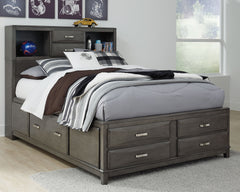 Contemporary style is shaping up beautifully. Designer elements are evident from every angle in this full storage bed. Quality crafted with dovetail construction, contoured drawers solve small space problems with ease. On one side of the bed a deep drawer