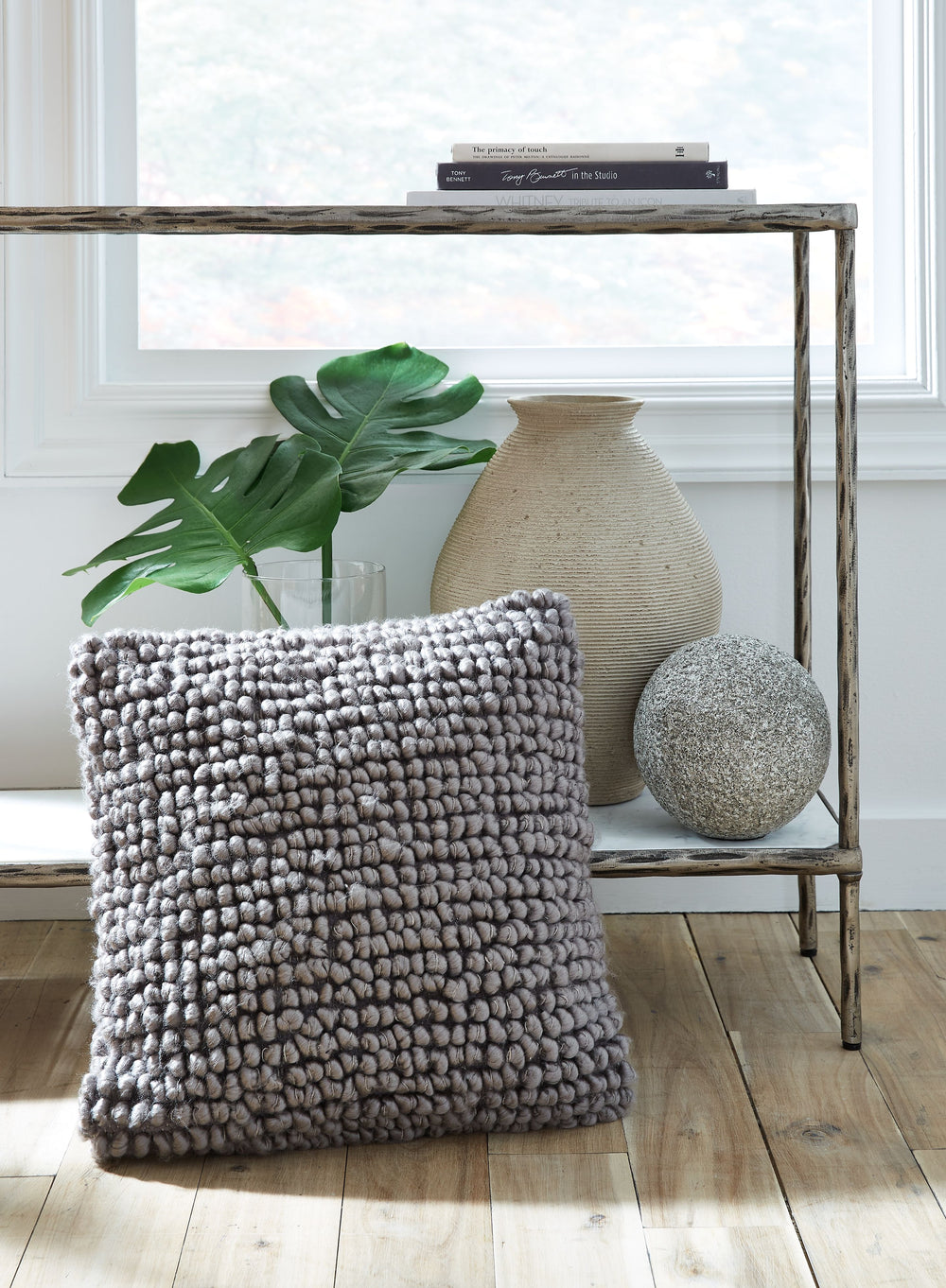 Bring textural interest to your decor with the visual intrigue of this throw pillow. Its luxuriously looped design is utterly charming, adding a relaxed sense of style wherever it-'s placed.<br/><br/><b>Product Features</b><ul><li>Face made of wool/polyes
