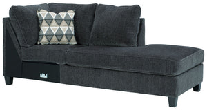 This right-arm facing corner chaise is made with polyester upholstery. Pairs with other items in the series to make a sectional.<br><br><b>Additional Dimensions</b><br><ul><li>Arm height: 27-"</li><li>Leg height: 4.5-"</li><li>Minimum width of doorway for