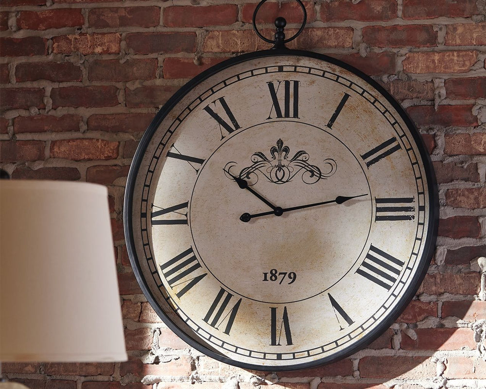 Turn back the hands of time with this wall clock. Large Roman numerals pop against the distressed cream finish to exude the timeworn splendor we cherish.<br/><br/><b>Product Features</b><ul><li>Made of metal</li><li>Keyhole hanger</li><li>Operates with 1 