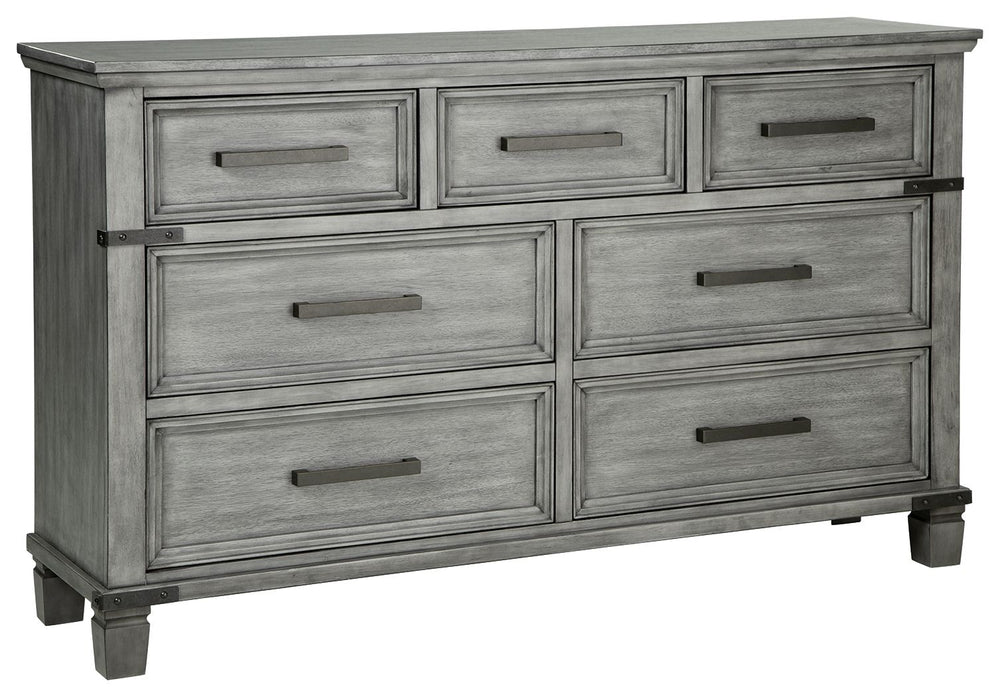 What-'s old is what-'s new with this dresser. Serving up a fresh look in urban farmhouse style, this eclectic piece features a light weathered gray finish with dark aged bronze-tone accents and metal straps for a casually cool sensibility. Profiled drawer