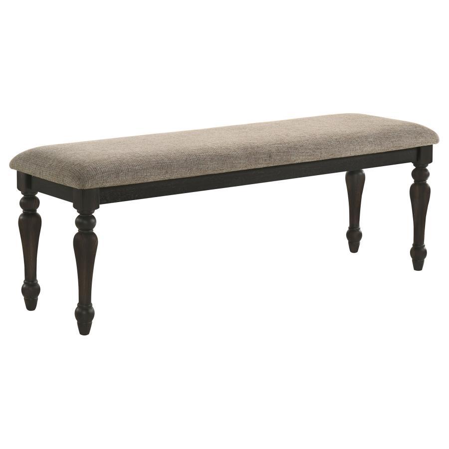 Instill casual elegance at a dining table or bring a refined touch to your entryway with a traditional backless bench. Its streamlined silhouette is accentuated with beautiful turned legs, offering classic character and dimensionality in any room. The ver