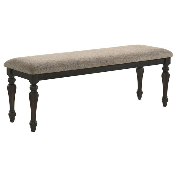 Instill casual elegance at a dining table or bring a refined touch to your entryway with a traditional backless bench. Its streamlined silhouette is accentuated with beautiful turned legs, offering classic character and dimensionality in any room. The ver