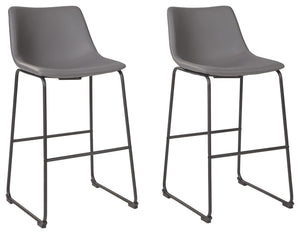 With its distinctive contoured bucket seat and tubular metal base, this bar stool serves up a fresh twist on mid-century inspired style. Chic gray faux leather upholstery adds to the aesthetic. What a timeless look for eat-in kitchens and casually cool di
