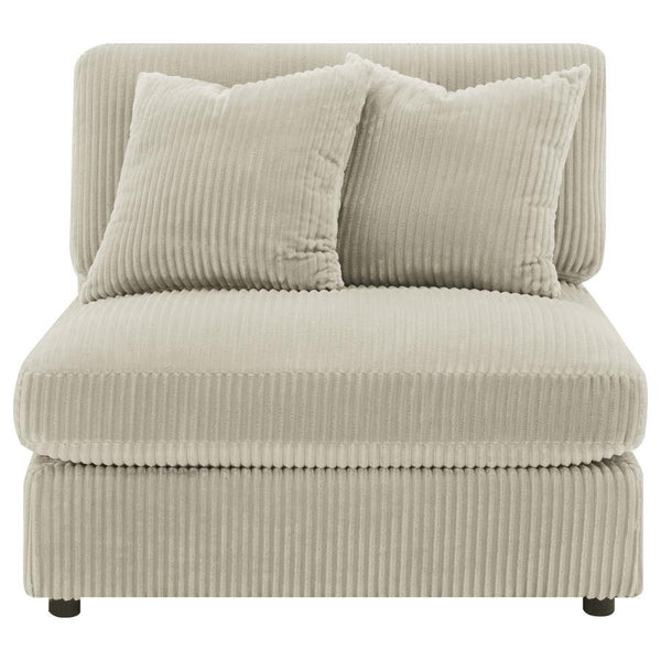  it features soft cushions and wide wale corduroy style upholstery in a soft neutral hue