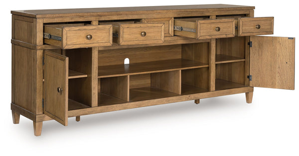  this TV stand brings easygoing elegance to the everyday. The light brown wood-tone finish seamlessly slips into your roomâ€™s aesthetic. Two spacious cabinets (each with an adjustable shelf)