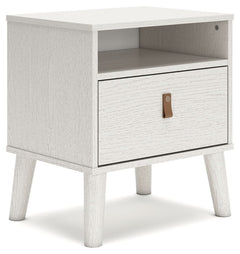 Dare to take minimalism to the max. This nightstand has an air of sleek simplicity thanks to its white painted finish with subtle replicated wood grain. Magnificently mod splay legs are a compelling complement to the streamlined design. And with two diffe