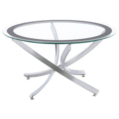 Infuse your living space with the warmth of a contemporary coffee table, designed to harmoniously blend modernity and comfort. The artfully curved, crisscrossing metal base is electroplated for a lustrous finish, supporting a clear tempered glass top enci