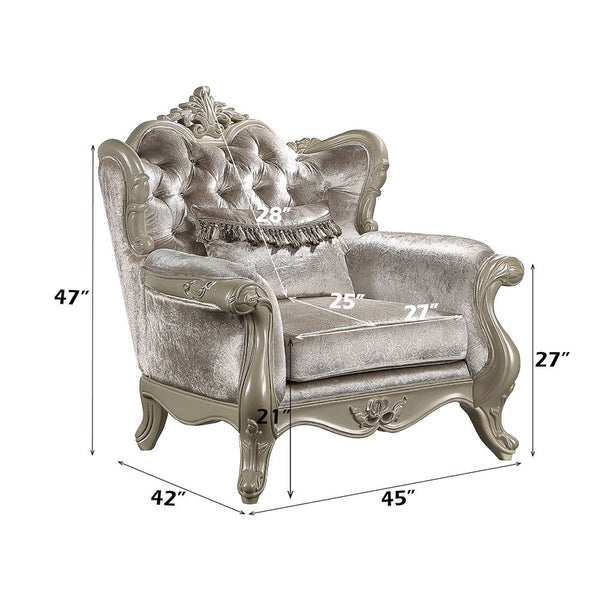  and armrests with a wooden inner frame. The tight back and loose seat cushions