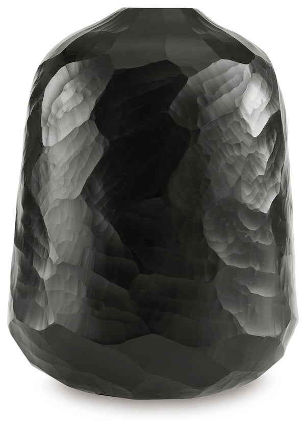 Put the accent on contemporary style with this vase. Wowing with multiple hand-carved facets, the cool black glass delivers true textural appeal from every angle. Itâ€™ll bring an artful touch wherever you see fit.<br/><br/><b>Product Features</b><ul><li>