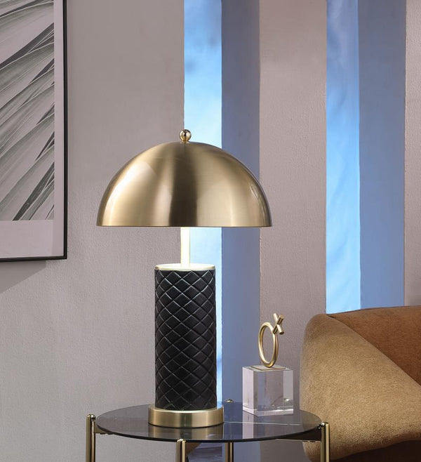  this matching set of dome table lamps blends quilted texture with a sleek metallic finish. The rounded dome shades cast warm downward light