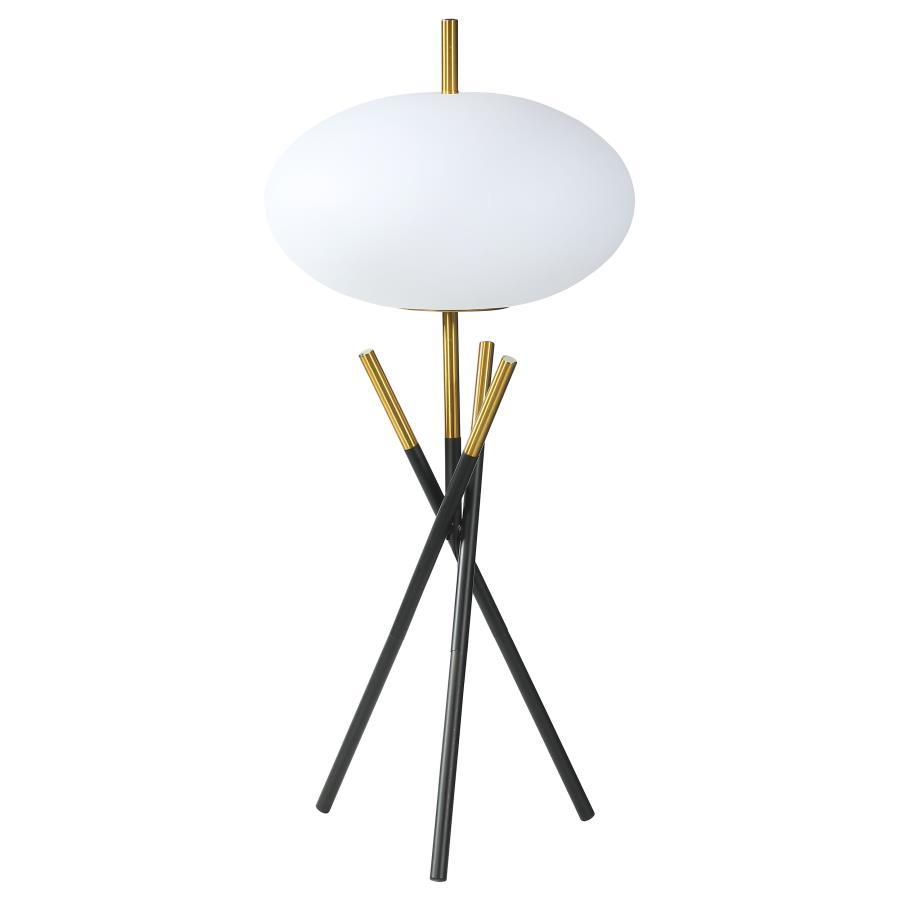 This table lamp offers a striking modern design with its unique tripod base and frosted globe-shaped shade. Crafted with a combination of sleek black and gold metal finishes, the lamp exudes elegance and contemporary charm. The frosted plastic shade provi