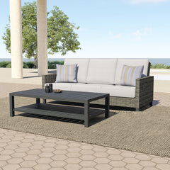 The Bungalow 2-Piece Outdoor Patio Set, featuring a sleek patio sofa and matching coffee table, offers the perfect blend of durability, comfort, and modern style for any outdoor space. Built with durable aluminum frames and a baked-on powder coat finish, 