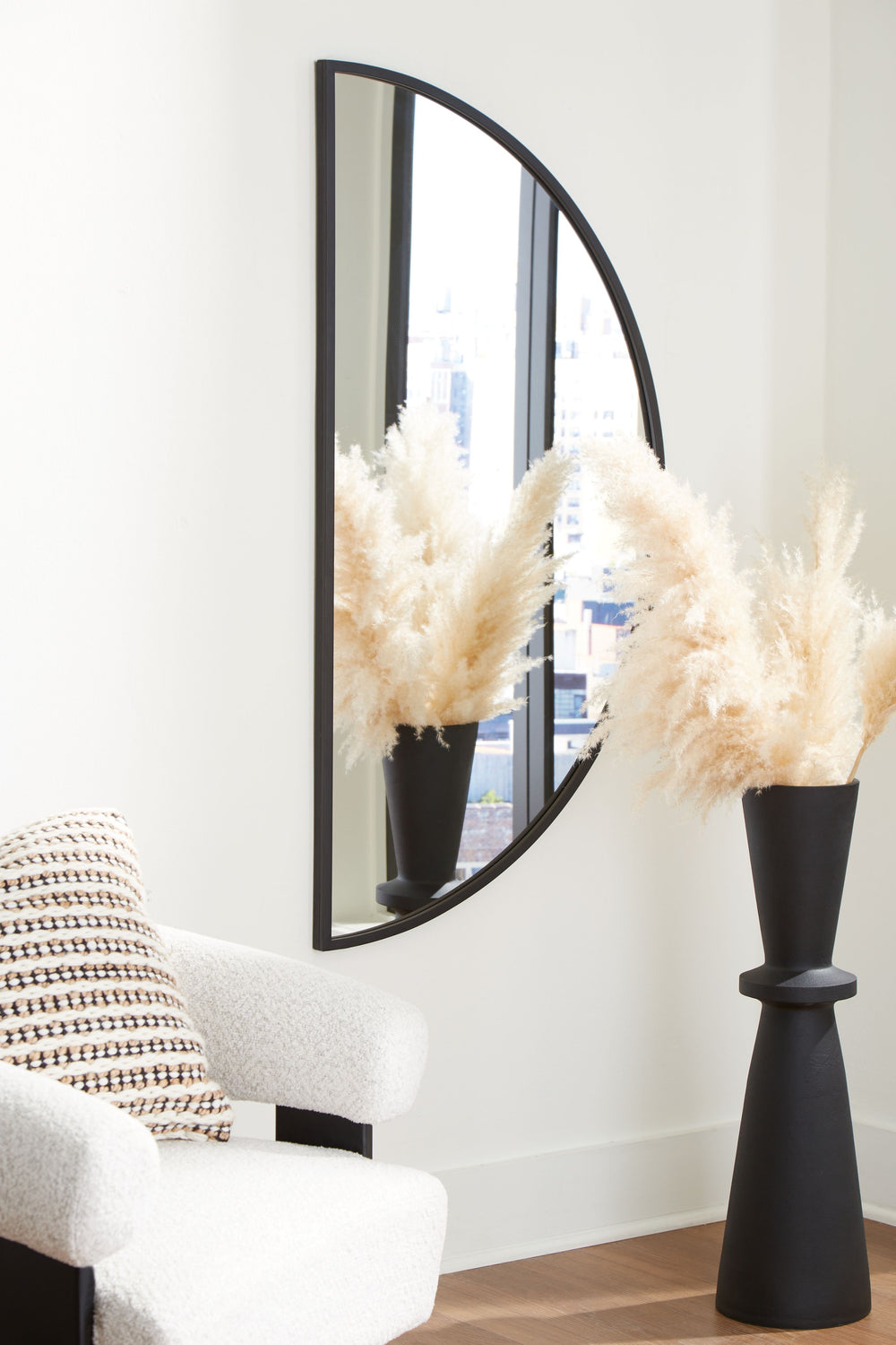 This half-moon mirror showcases a sleek, elegant design that fits perfectly in entryways or above dressers. Its modern aesthetic adds style and a sense of openness wherever it-'s displayed.<br><br><b>Additional Dimensions</b><br><ul><li>Inner mirror: 0-"<