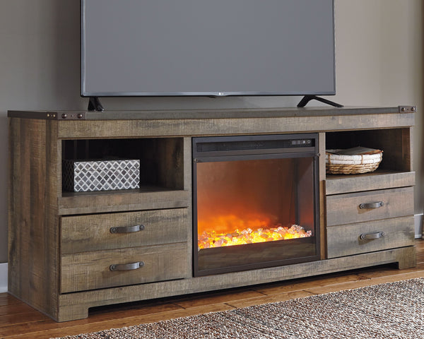 This TV stand with fireplace option makes home on the range look so alluring. The aesthetic is earthy yet clean and sophisticated, with a rustic finish, plank-style details and nailhead trim that pay homage to reclaimed barn wood. Removing the center shel