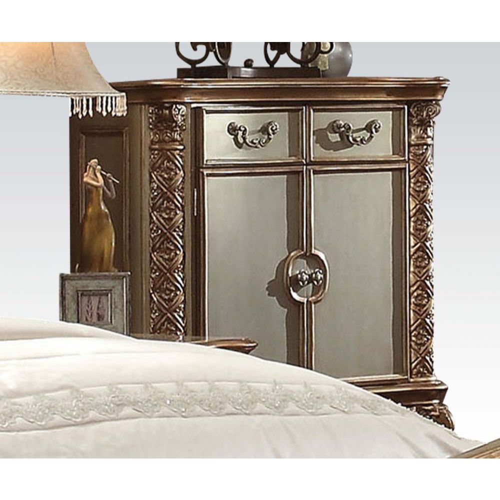 Create an elegant, traditional design in your bedroom with the gold patina and bone Vendome chest. This hand-crafted piece inspired from the luxurious designs of the past, this three-drawer, two-door chest features elaborate wood carving details, traditio