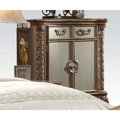 Create an elegant, traditional design in your bedroom with the gold patina and bone Vendome chest. This hand-crafted piece inspired from the luxurious designs of the past, this three-drawer, two-door chest features elaborate wood carving details, traditio