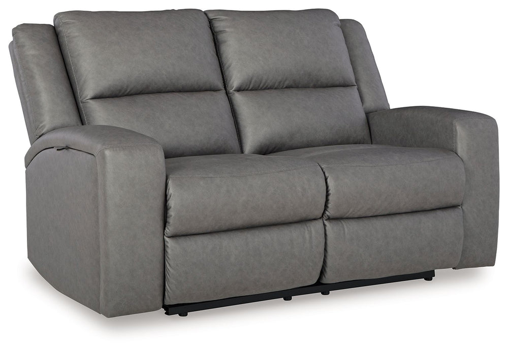 This reclining loveseat appeals to your love for feature-filled furniture, all while maintaining a clean-lined and contemporary design. Pop-out storage and cup holders keep essentials close when you need them and tuck away easily when you donâ€™t. Time to