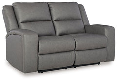 This reclining loveseat appeals to your love for feature-filled furniture, all while maintaining a clean-lined and contemporary design. Pop-out storage and cup holders keep essentials close when you need them and tuck away easily when you donâ€™t. Time to
