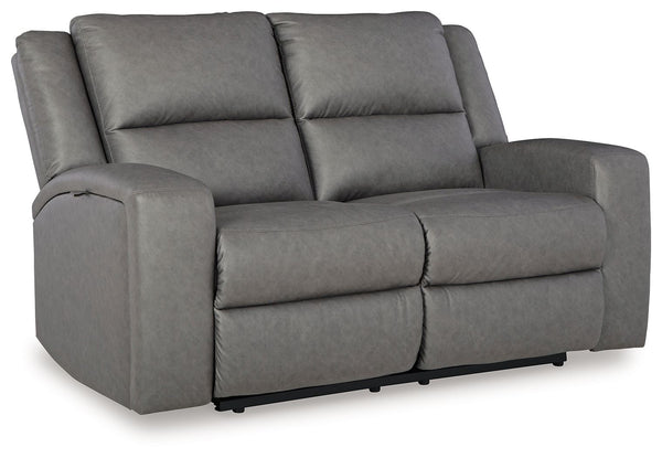 This reclining loveseat appeals to your love for feature-filled furniture, all while maintaining a clean-lined and contemporary design. Pop-out storage and cup holders keep essentials close when you need them and tuck away easily when you donâ€™t. Time to