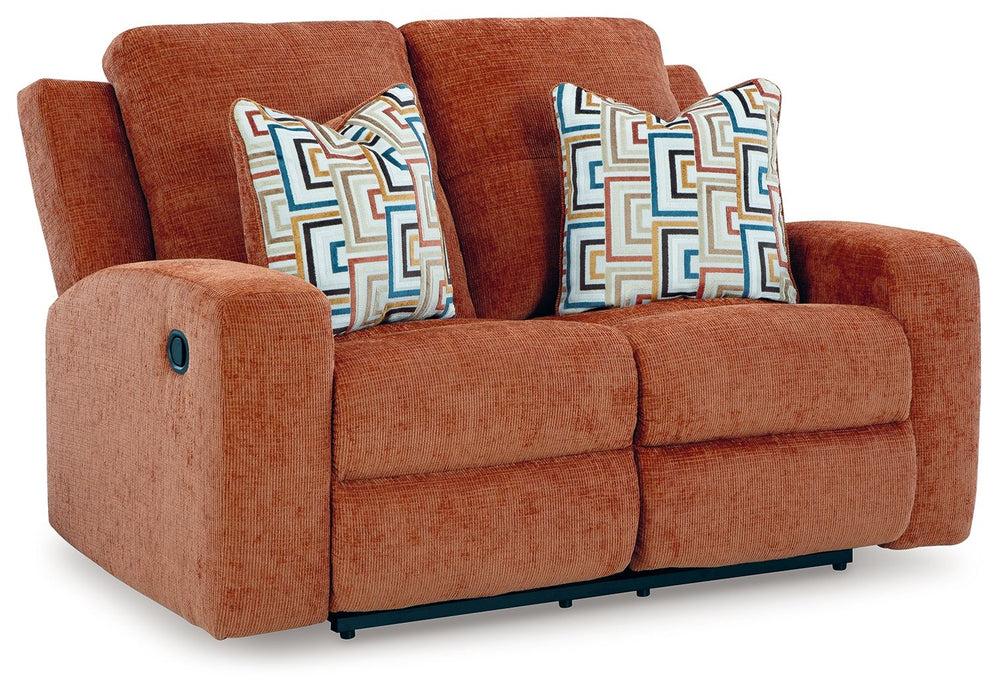 This reclining loveseat invites you to a luxuriously soft lounging experience. The chic hue fits right in with contemporary color palettes. A tufted back keeps the look right on trend. Balancing style and function, its pull tab reclining effortlessly take