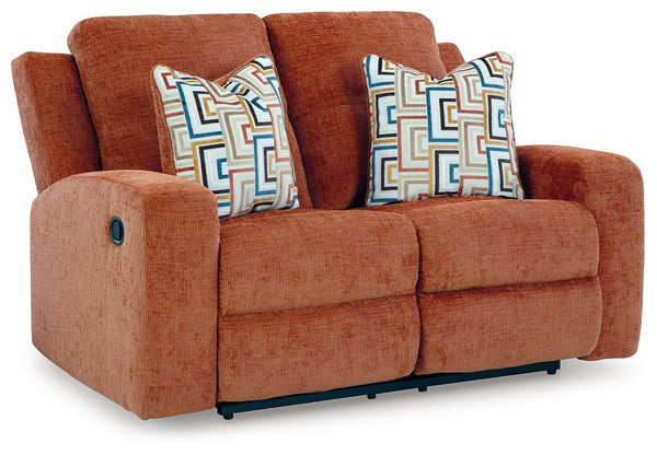 This reclining loveseat invites you to a luxuriously soft lounging experience. The chic hue fits right in with contemporary color palettes. A tufted back keeps the look right on trend. Balancing style and function, its pull tab reclining effortlessly take