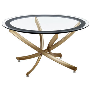 Infuse your living space with the warmth of a contemporary coffee table, designed to harmoniously blend modernity and comfort. The artfully curved, crisscrossing metal base is electroplated for a lustrous finish, supporting a clear tempered glass top enci