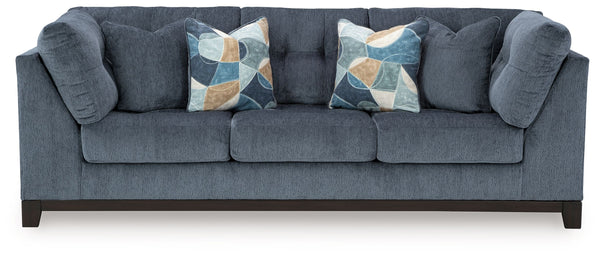 Fresh, on-trend style meets functionality in this sofa. Details like tufted cushions and a wrap-around accent base reflect your urban contemporary tastes while staying versatile as your style changes. And with its soft upholstery, your comfort is kept a p