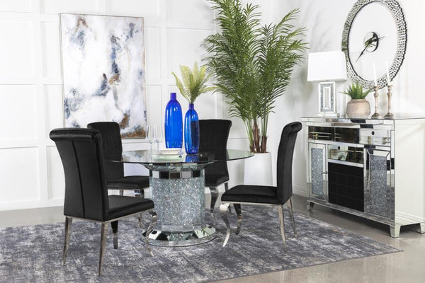  clear glass top reveals the scintillating column-inspired pedestal frame beneath