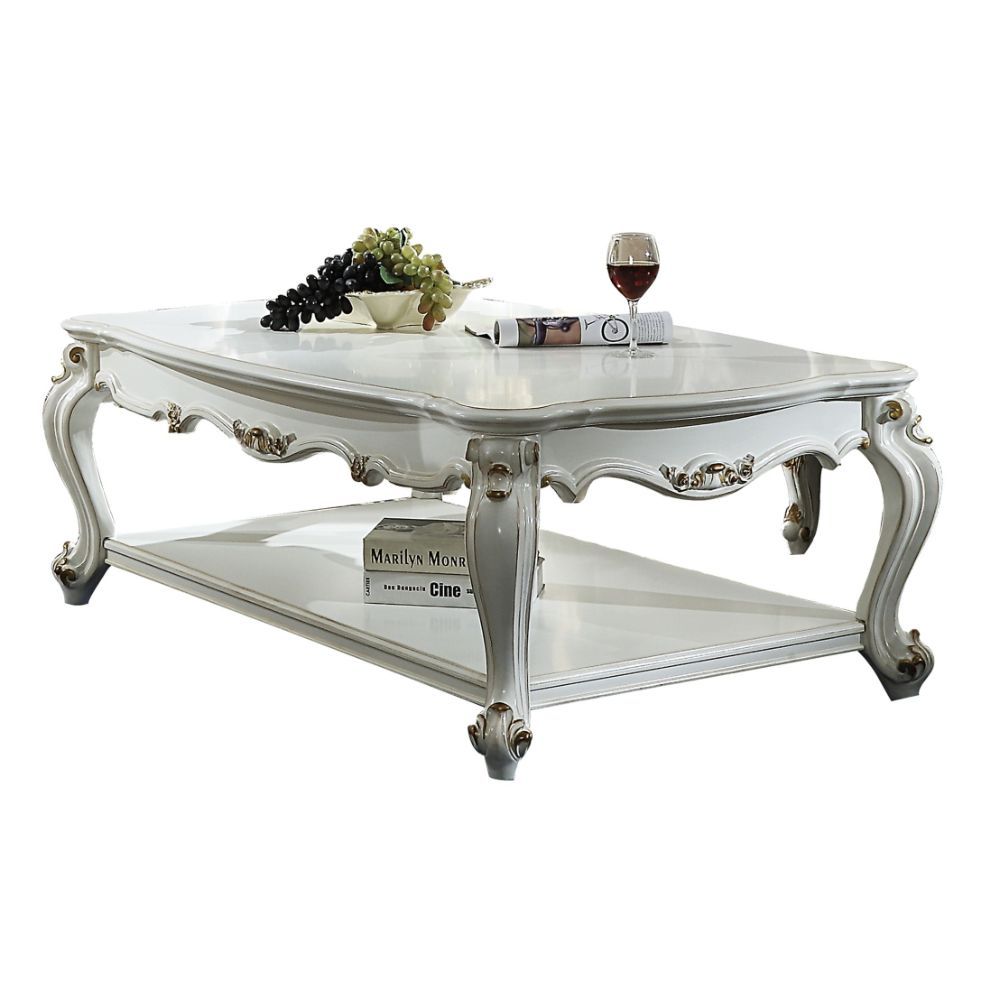 Inspire your home and create an upscale atmosphere with the Picardy Coffee Table. This coffee table adds classic style to any sitting area featuring a traditional handcrafted design. This luxurious coffee table features a solid wood frame in antique pearl