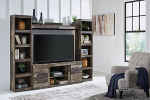 Make this entertainment center the center of attention with its popular urban eclectic style. Its rustic finish over a replicated pine grain creates an authentic natural look for your home entertainment area. You-'ll love its functionality. Two tall piers