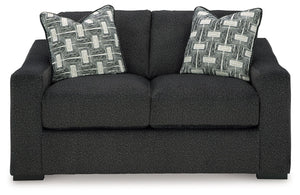 Your downtime should be super-cozyâ€”and super-chic. This loveseat encourages stylish indulgence as you lounge solo or with guests. Plush, chunky upholstery adds a relaxed yet eclectic twist to the transitional look. With this exquisitely comfortable and 