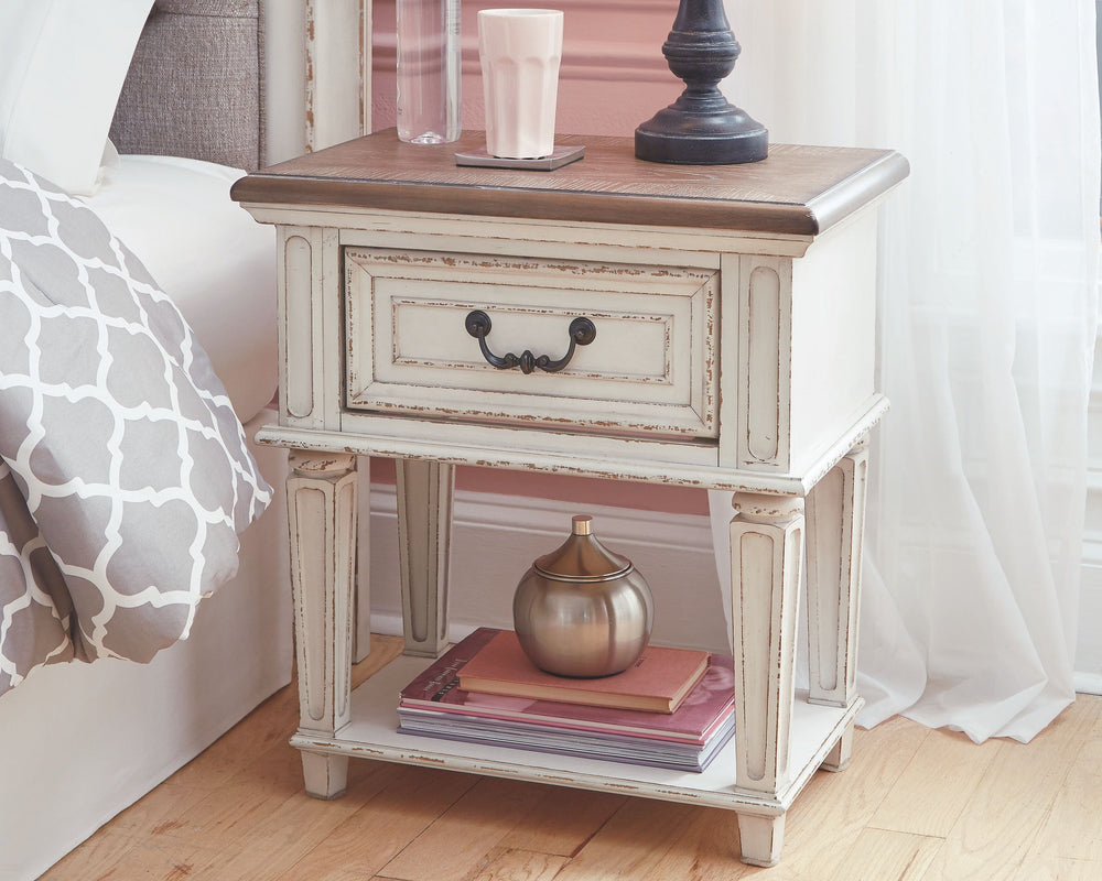 Elevating the art of traditional cottage styling, this nightstand is your dream bedroom retreat realized. Antiqued two-tone aesthetic blends a chipped white with a distressed wood finished top for added charm. Adorned with classic bail pull hardware, the 