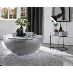 Looking for cutting-edge style? The industrial Brancaster round coffee table is the perfect conversation piece. With features like aluminum patchwork with rich overtones and convenient, discrete storage, this unusual coffee table is sure to impress.<br/><