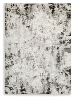 Upgrade your space with unapologetic glamour. This area rug serves as a simplistic yet compelling representation of modern decor. Its abstract design, subtle hues, refined machine woven construction and soft durable yarns provide long-lasting beauty and c