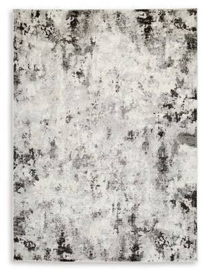 Upgrade your space with unapologetic glamour. This area rug serves as a simplistic yet compelling representation of modern decor. Its abstract design, subtle hues, refined machine woven construction and soft durable yarns provide long-lasting beauty and c